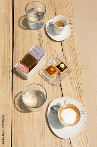 Coffee served on a restaurant table, top view