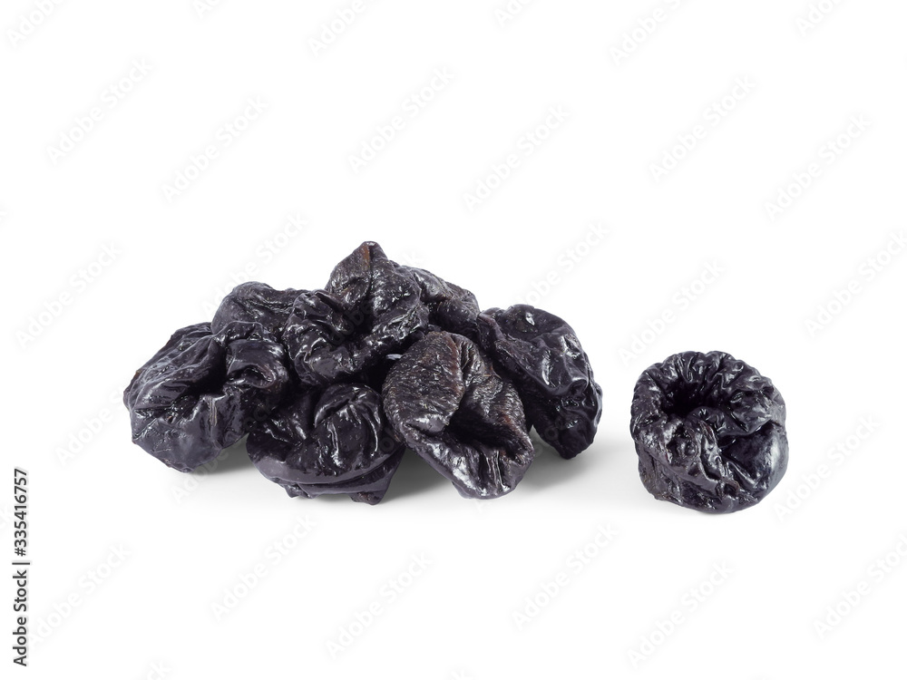 Heap of dried prunes isolated on white background. Healthy snack. Heap of dried prunes isolated on white background. Healthy snack.