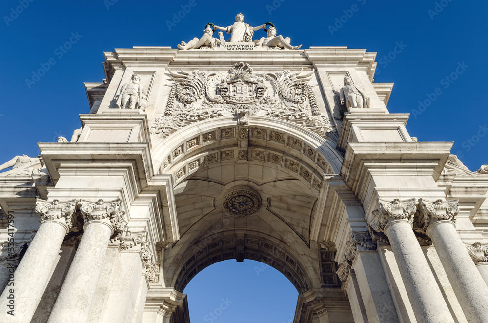 Arco da Rua Augusta, monumental trimphal arch to the main street of Lisbon, Portugal, seen from Praca do Comercio (Commerce Square), build to commemorate the rebuild of the city after 1755 earthquake