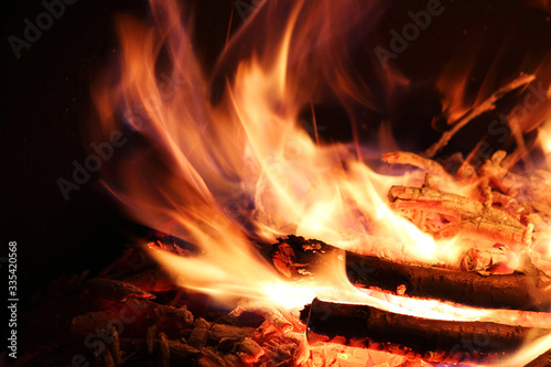Defocused Background. Fire flame on a black background. Close-up.