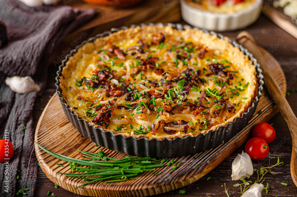 Homemade cheese quiche with onion and bacon Homemade cheese quiche with onion and bacon