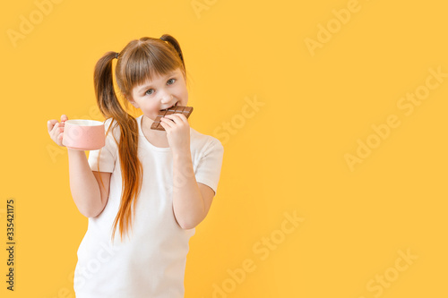 Cute little girl with choco...