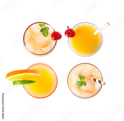 Set of Tequila Sunrise cocktails on white background, top view