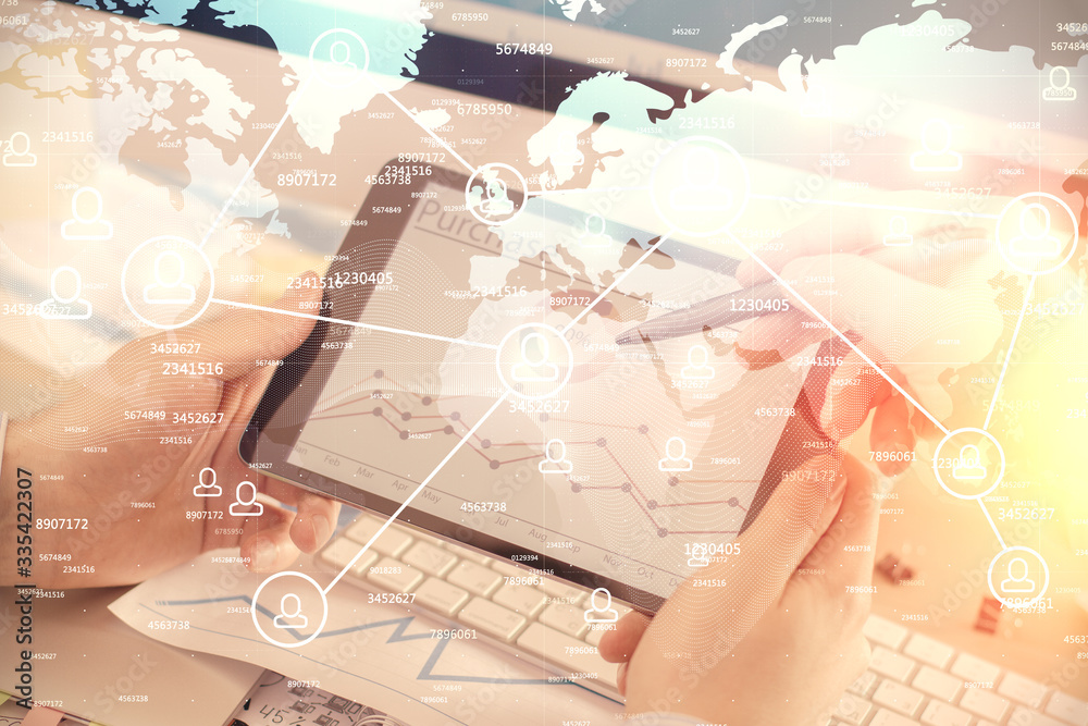 Double exposure of man's hands holding and using a phone and social network theme drawing. Double exposure of man's hands holding and using a phone and social network theme drawing.