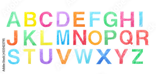 Set of letters written with color pencils on white background, top view. Banner design