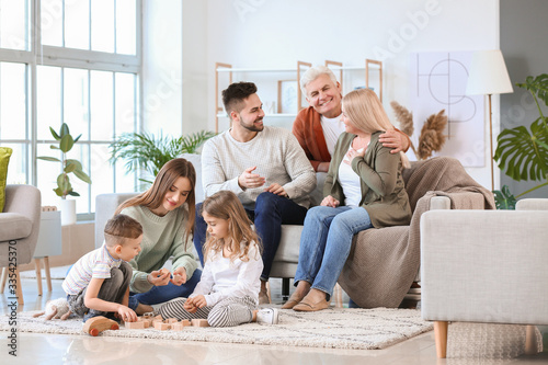 Big family spending time together at home photo