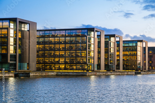 modern buildings on Copenhagen embankment, evening view