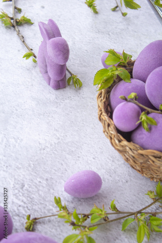 colorful easter eggs and branch with flowers