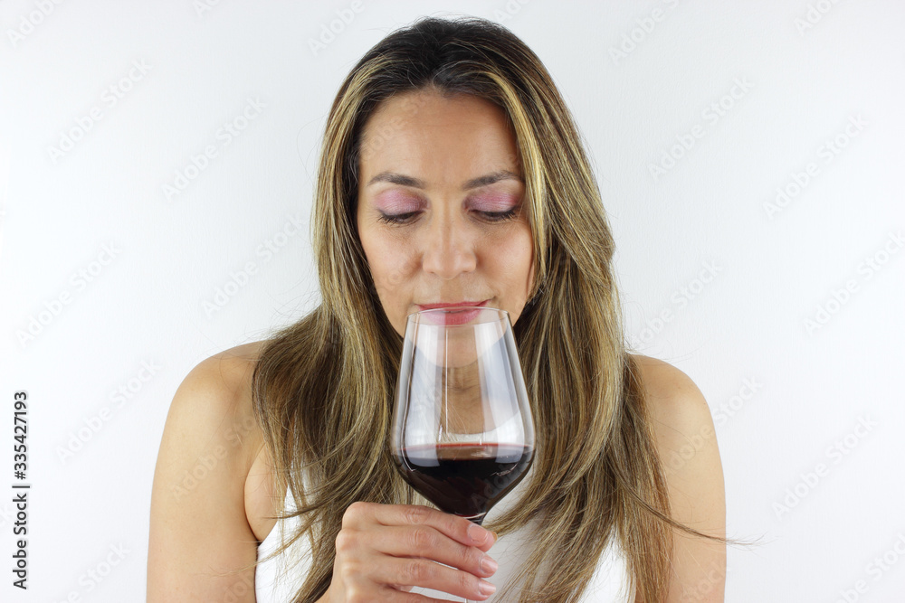 Beautiful Latin American Woman with a glass of red Wine Beautiful Latin American Woman with a glass of red Wine