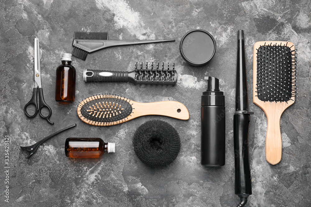 Set of hairdresser’s accessories on grey background Stock Photo | Adobe