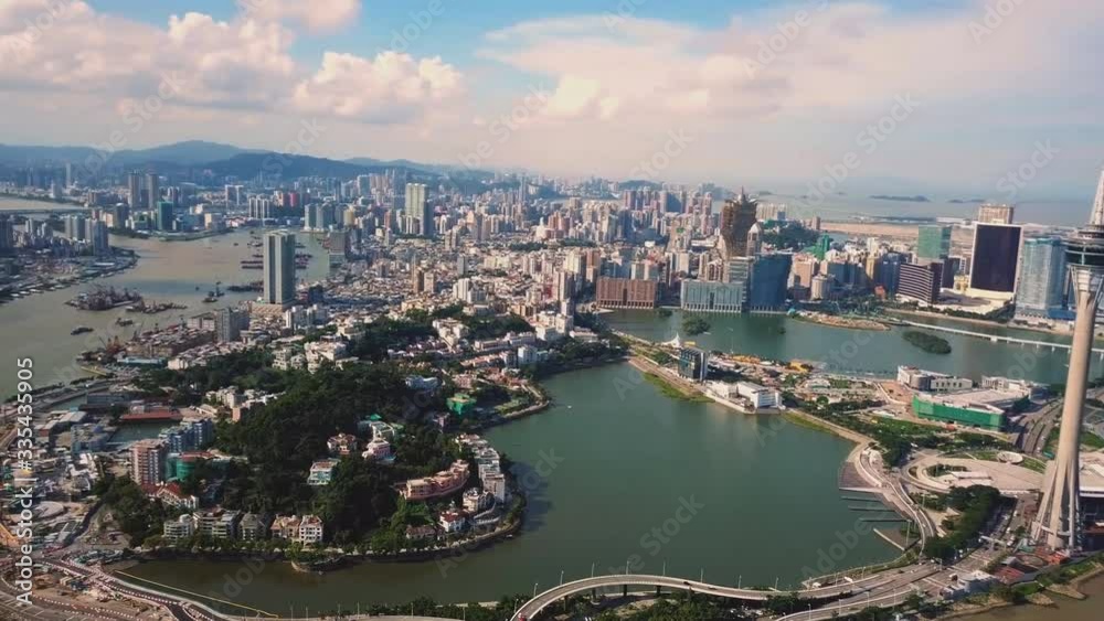 Macau, China. Skyline of Macao Praia Grande, Sai Van Bridge, Taipa District and Tower, Torre de Macau. (aerial photography) Macau, China. Skyline of Macao Praia Grande, Sai Van Bridge, Taipa District and Tower, Torre de Macau. (aerial photography)
