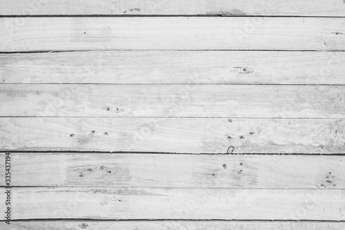 Fototapeta Naklejka Na Ścianę i Meble -  Wood plank white timber texture background. Old wooden wall all have antique cracking furniture painted weathered peeling wallpaper . Vintage table plywood woodwork hardwoods at summer for copy space.