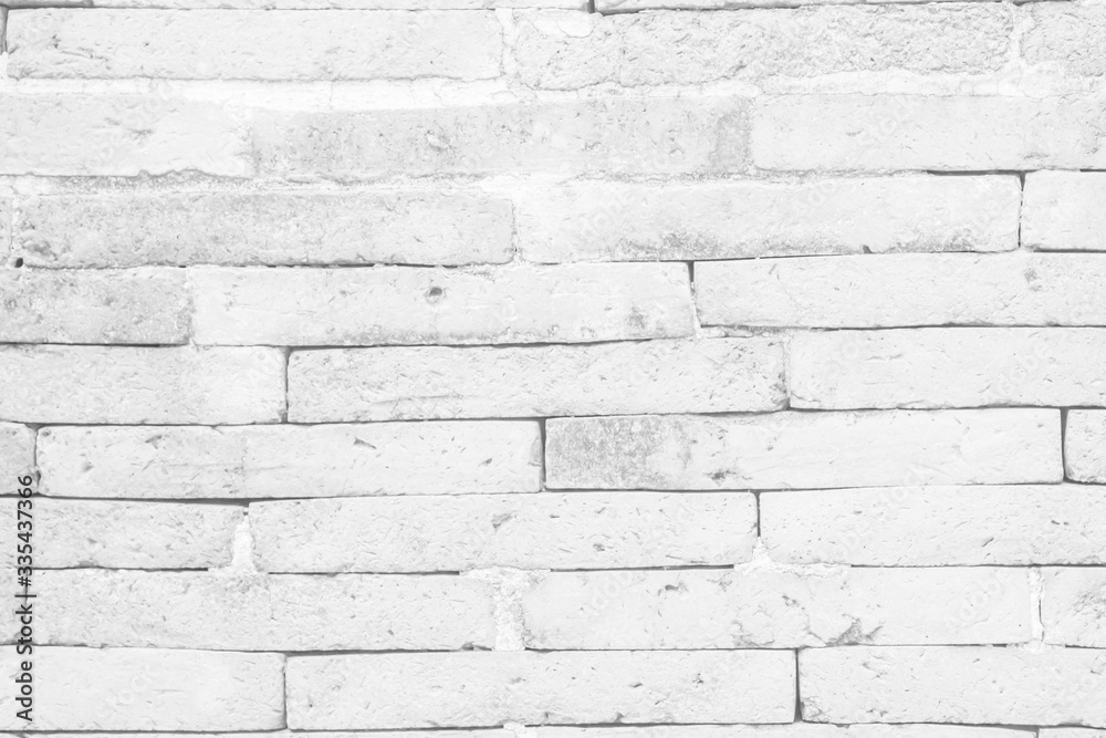 Fototapeta premium White brick wall texture background in room at subway. Brickwork