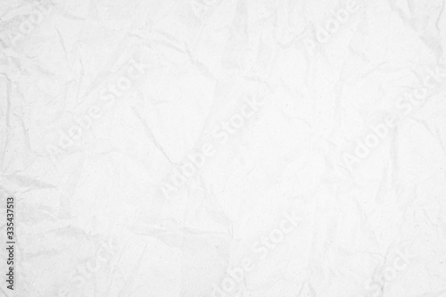 White recycled craft paper texture as background. Grey paper tex