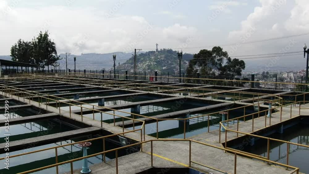 water reservoir in a big city Quito Ecuador aerial shot water reservoir in a big city Quito Ecuador aerial shot
