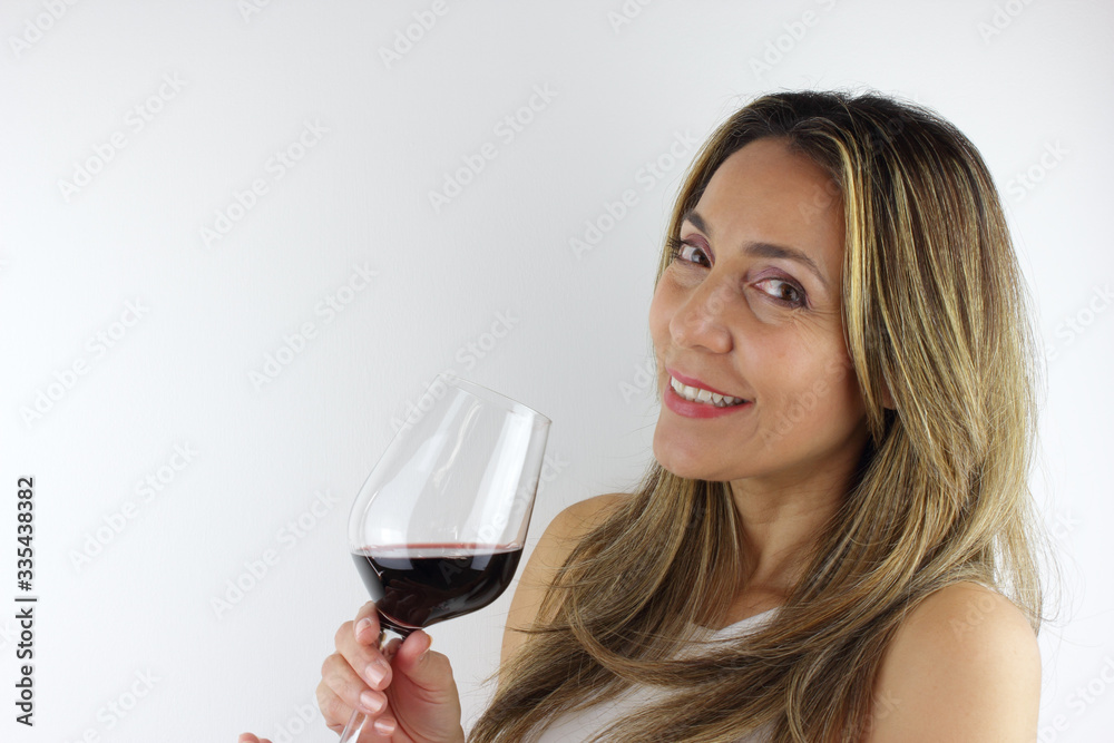 Beautiful Colombian woman with a glass of red wine Beautiful Colombian woman with a glass of red wine