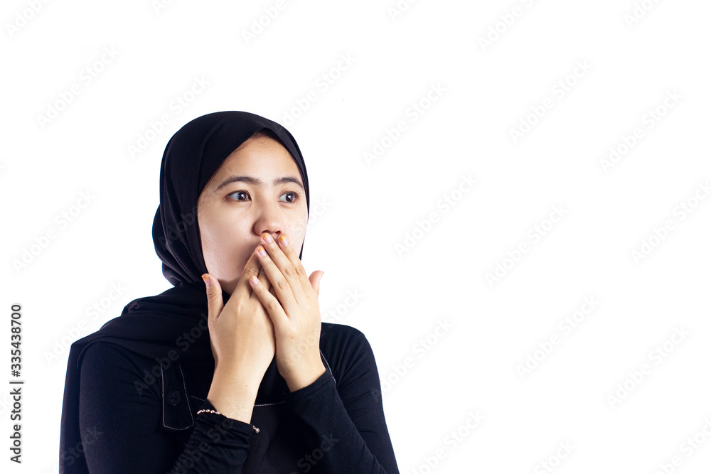 Happy surprised beauty woman in hijab. Portrait of smiling girl, posing at white studio background. Young emotional woman. The human emotions, facial expression concept. Front view. Happy surprised beauty woman in hijab. Portrait of smiling girl, posing at white studio background. Young emotional woman. The human emotions, facial expression concept. Front view.