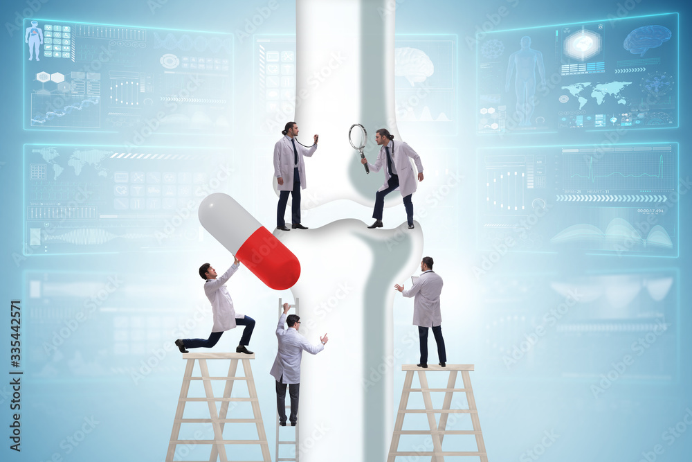 Obraz premium Doctors treating the bone joint