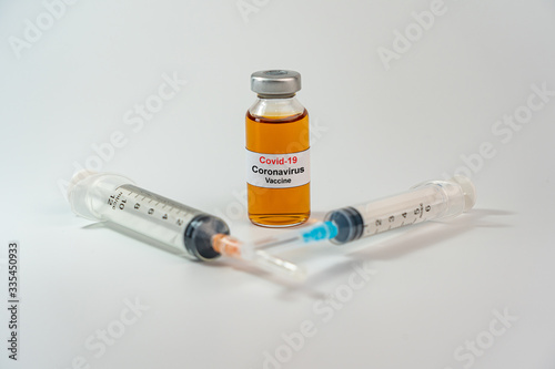 Covid-19 Coronavirus vaccine bottle and syringe injection