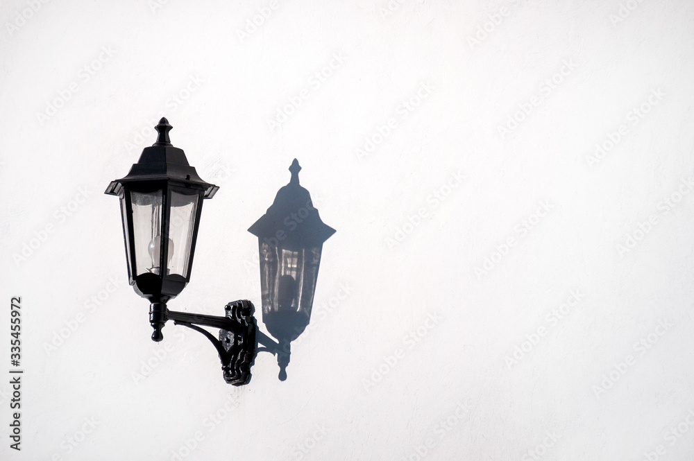 old street lamp on wall