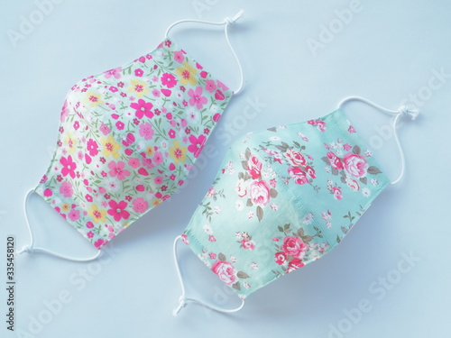 Fabric mask with sweet flower pattern. Used to prevent dust and viruses covid19 in the air