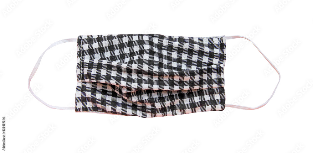 Fabric mask with rubber ear straps isolated on white background and clipping path Fabric mask with rubber ear straps isolated on white background and clipping path