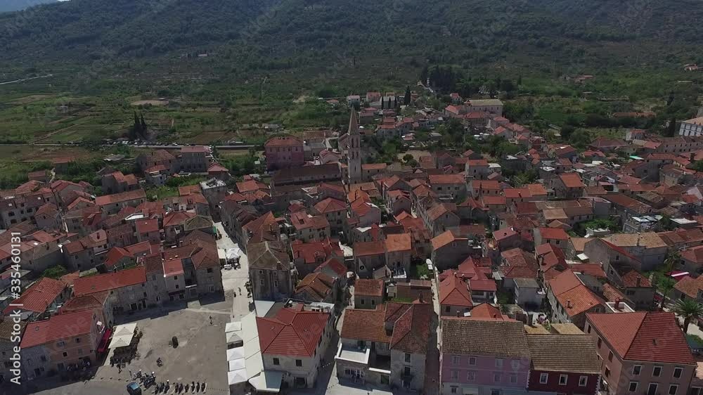 Flying from a drone Phantom over the old islands and cities of Italy, yachts, chapels, moorings Flying from a drone Phantom over the old islands and cities of Italy, yachts, chapels, moorings