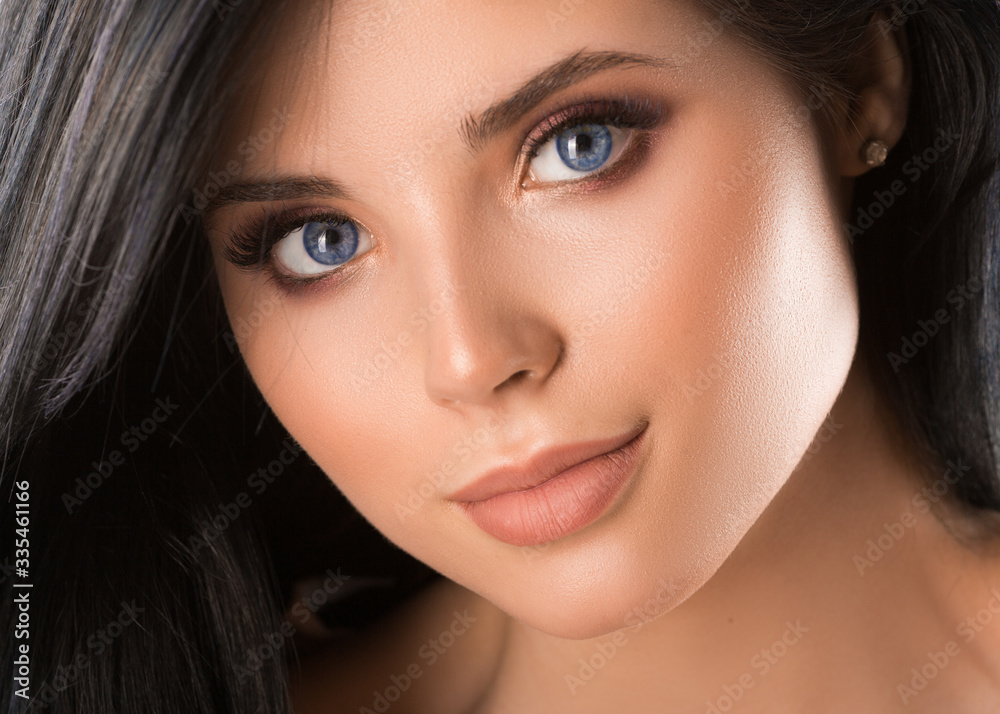 Close up portrait of a beautiful young woman. Close up portrait of a beautiful young woman.
