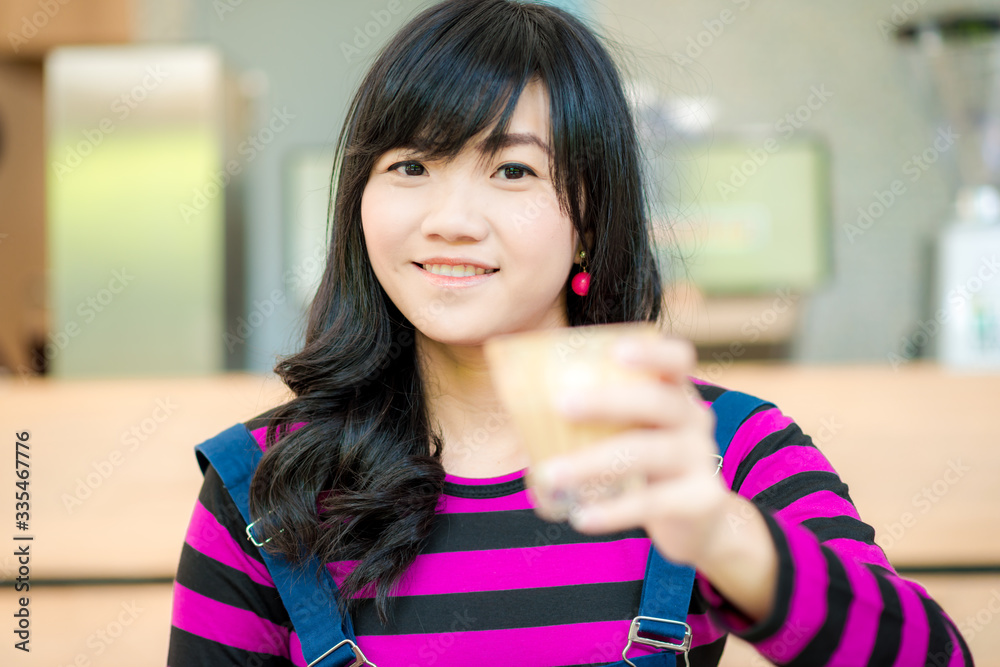 Beautiful business asian women drinking hot latte art coffee Beautiful business asian women drinking hot latte art coffee