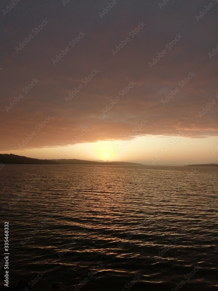 Obraz premium sunset over the sea in Ancud, Chile