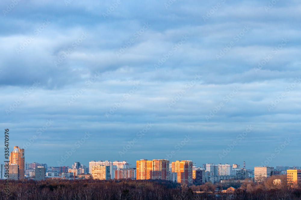 blue clouds over residential district in evening blue clouds over residential district in evening