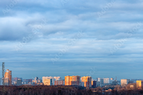 blue clouds over residential district in evening © vvoe