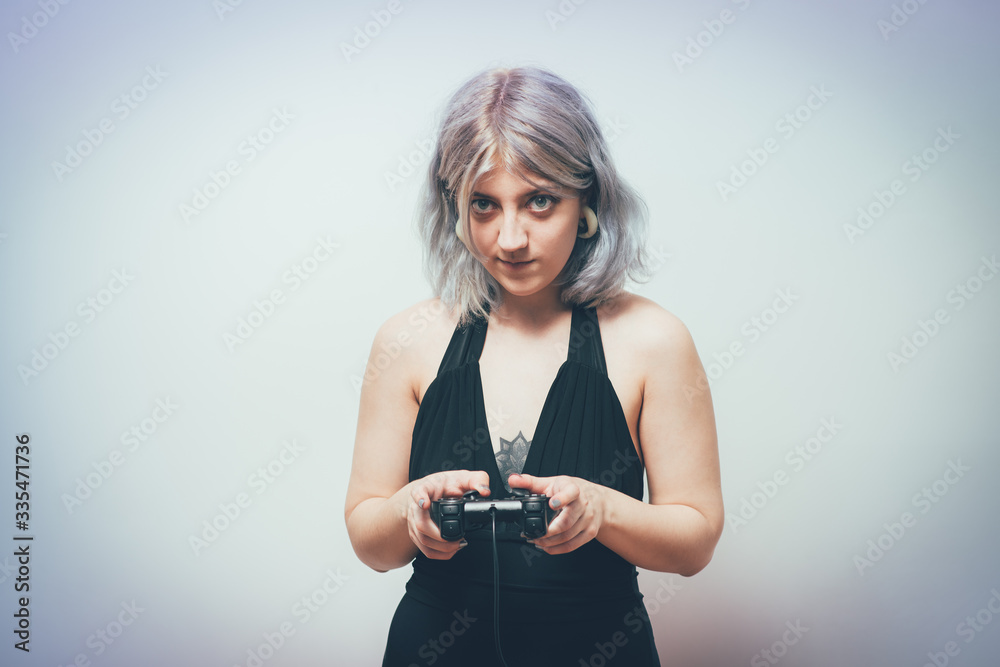 Woman playing on the joystick in a game console Woman playing on the joystick in a game console