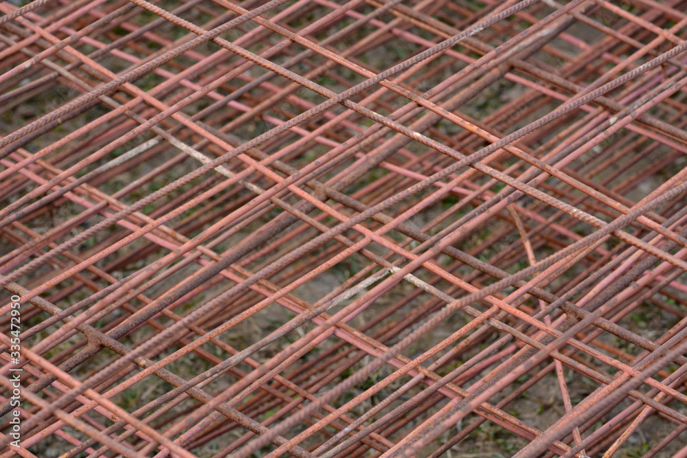 old metal fence with grate disassembled on the street
old metal fence with grate disassembled on the street