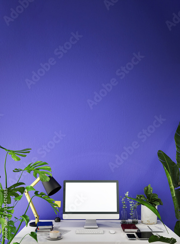 estop computer screen on white desk,working space,working background ,interior of woking room,work from home,classic blue concept
 photo