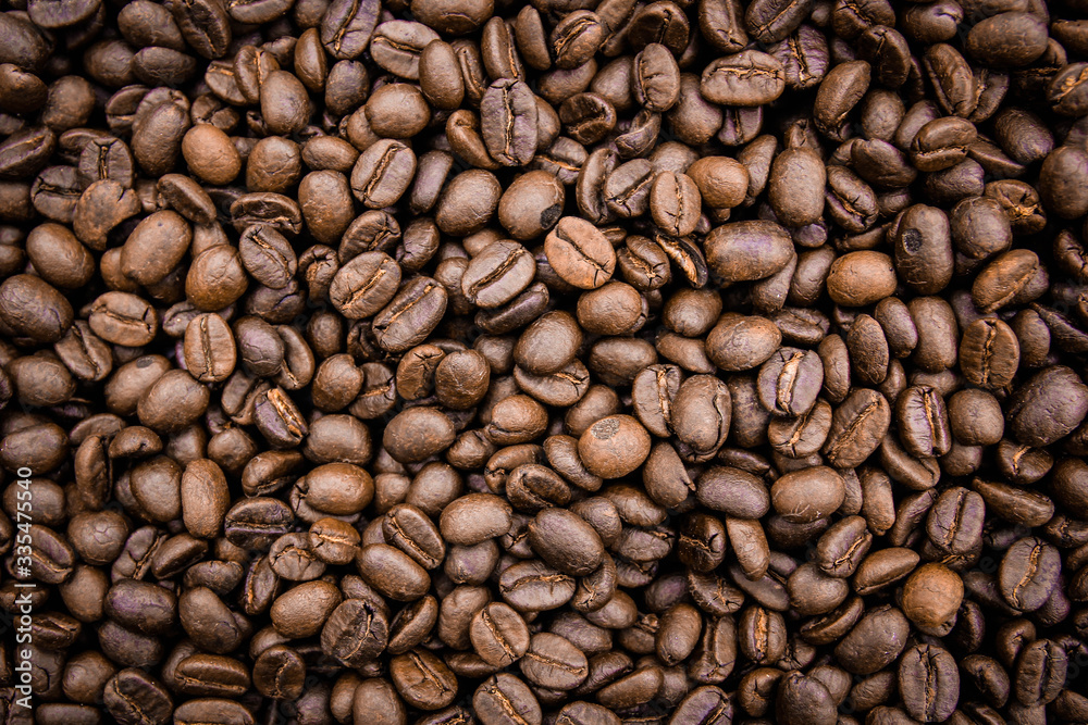 Obraz premium roasted coffee bean texture background.