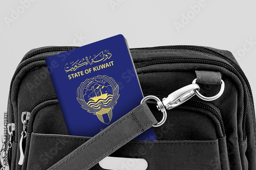 Close up of Kuwait Passport in Black Travel Bag Pocket