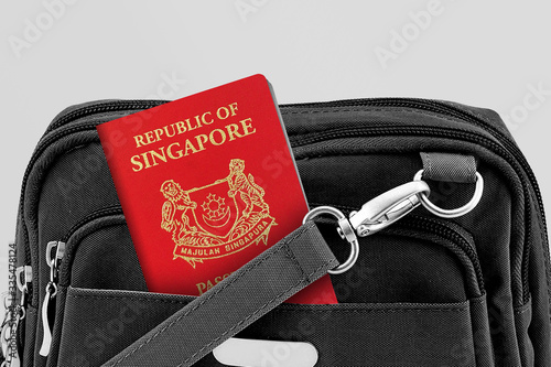 Close up of Singapore Passport in Black Travel Bag Pocket