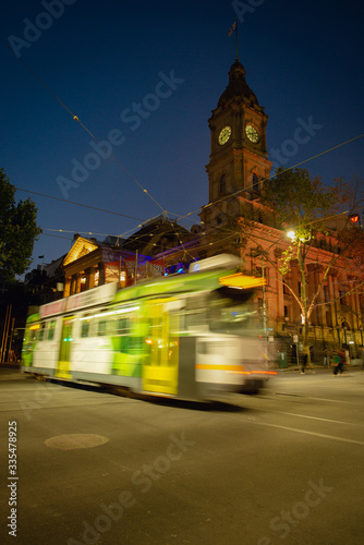 Melbourne architecture at night with city traffic
