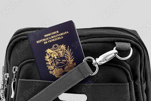 Close up of Venezuela Passport in Black Travel Bag Pocket