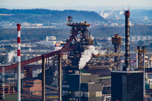 view from mountain pfenningberg near steyregg to the city of linz with steel and chemical industry, upper austria photo