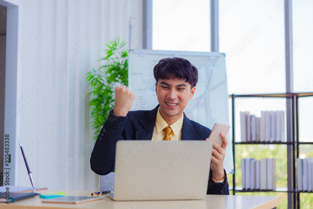 Young businessmen are greeting business partners on a computer screen via teleconferencing during the coronavirus (COVID-19) crisis. Young businessmen are greeting business partners on a computer screen via teleconferencing during the coronavirus (COVID-19) crisis.