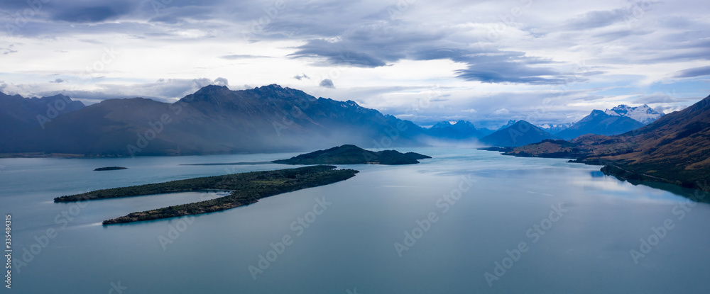 Dark and Grim Lake Wakatipu and Southern Alps Mountains after sunset