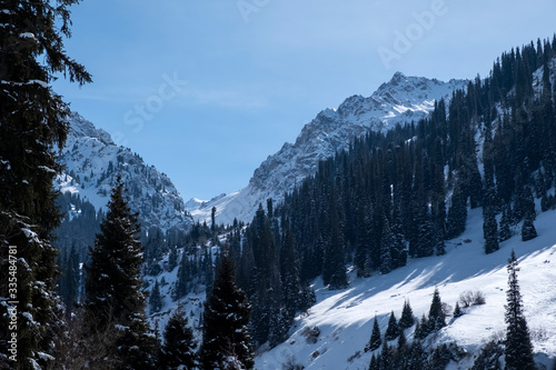 Winter mountains covered with snow landscape. Tien shan mountains in winter. © Adil