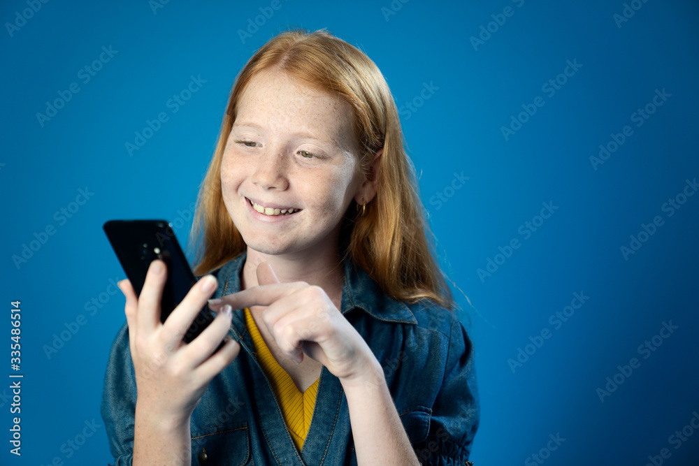 Portrait of Preteen Girl Holding and Pointing Her Smartphone Copyspace Portrait of Preteen Girl Holding and Pointing Her Smartphone Copyspace