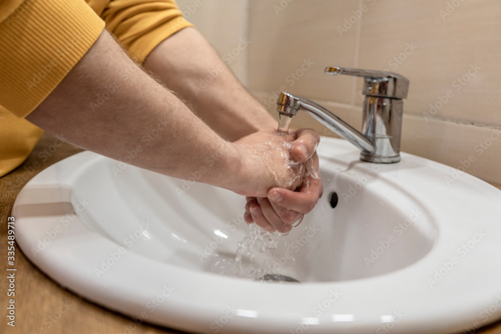 man's hand washing
