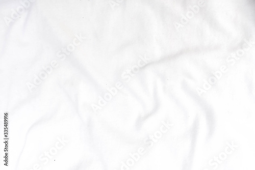 Abstract white fabric texture background. Wavy white cloth. 