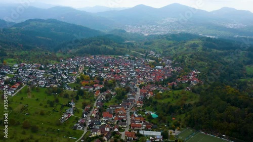 Aerial view of the city  Loffenau in Germany  on a cloudy day in autumn, fall.  photo