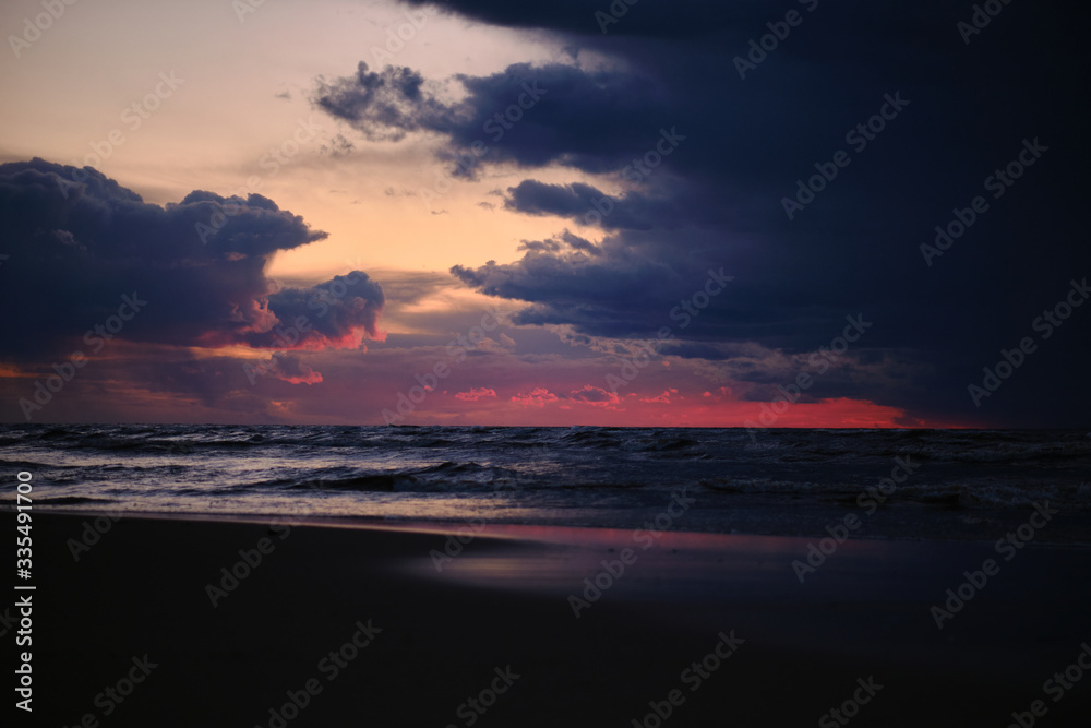 Dark cloudy sunset over the sea