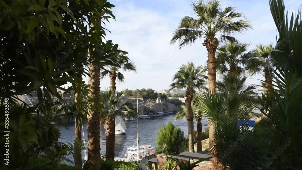Beautiful landscape with felucca boats on Nile river in Aswan , Egypt Beautiful landscape with felucca boats on Nile river in Aswan , Egypt